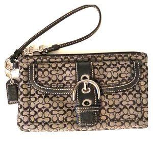 Black and gray Coach wristlet